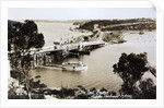 Sydney Spit Bridge, Middle Harbour, Sydney, New South Wales, Australia in 1924. The bridge shown is a wooden lifting bridge. On the road, there are cars of the period. by Anonymous