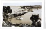Sydney Spit Bridge, Middle Harbour, Sydney, New South Wales, Australia in 1924. The bridge shown is a wooden lifting bridge. On the road, there are cars of the period. by Anonymous