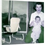 Proud new mother with baby, ca. 1956. by Anonymous