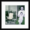Proud new mother with baby, ca. 1956. by Anonymous