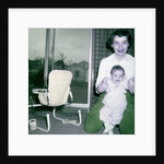 Proud new mother with baby, ca. 1956. by Anonymous