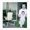 Proud new mother with baby, ca. 1956. by Anonymous