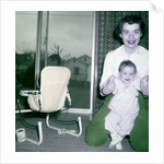Proud new mother with baby, ca. 1956. by Anonymous
