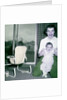 Proud new mother with baby, ca. 1956. by Anonymous