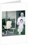 Proud new mother with baby, ca. 1956. by Anonymous