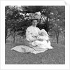 OIder woman and baby in a English park, ca. 1900. by Anonymous