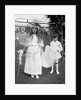 Young girl and attending young boy, ca. 1900. by Anonymous