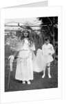 Young girl and attending young boy, ca. 1900. by Anonymous