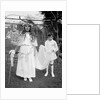 Young girl and attending young boy, ca. 1900. by Anonymous