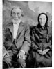 Grandma and Grandpa in a tintype portrait, ca. 1870s. by Anonymous