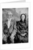 Grandma and Grandpa in a tintype portrait, ca. 1870s. by Anonymous
