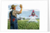Farmer waving to a crop duster by Anonymous