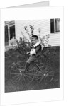 Toddler on a period tricycle, ca. 1895. by Anonymous