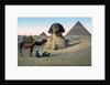 Men praying to Mecca in front of the Sphinx and pyramids by Anonymous