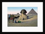 Men praying to Mecca in front of the Sphinx and pyramids by Anonymous