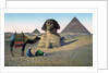 Men praying to Mecca in front of the Sphinx and pyramids by Anonymous