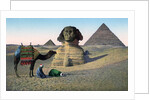Men praying to Mecca in front of the Sphinx and pyramids by Anonymous