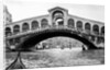 Gondola view of the Rialto Bridge in Venice, Italy, ca. 1912. by Anonymous