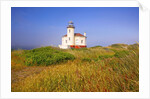 Morning light adds beauty to fog and Coquille River Lighthouse, Bandon, Oregon Coast, Pacific Ocean, by Anonymous