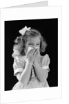 1940s little blond girl ribbon in hair holding tissue to nose sneezing by Anonymous
