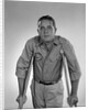 1960s man walking on crutches looking at camera by Anonymous