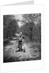 1950s boy beagle puppy walking down country road whistling carrying fishing pole pail fish by Anonymous