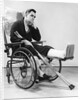 1940s man in wheelchair with cast on left leg holding crutches by Anonymous