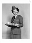 1940s army woman with lunch tray with a glass of milk and sandwich by Anonymous