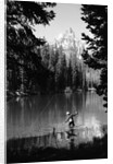 1960s man fishing holding net and rod wyoming grand teton national park string lake by Anonymous