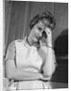 1960s housewife with headache by Anonymous