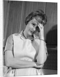 1960s housewife with headache by Anonymous