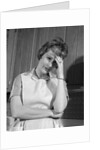 1960s housewife with headache by Anonymous