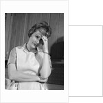 1960s housewife with headache by Anonymous