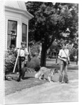 1940s boy with fishing gear collie dog second boy mowing grass with push mower by Anonymous