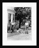 1940s boy with fishing gear collie dog second boy mowing grass with push mower by Anonymous