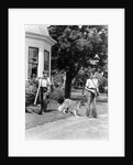 1940s boy with fishing gear collie dog second boy mowing grass with push mower by Anonymous