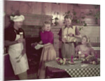 1950s 2 couples cooking picnic in rustic kitchen drinking beer by Anonymous