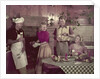 1950s 2 couples cooking picnic in rustic kitchen drinking beer by Anonymous