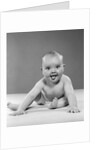 1950s portrait of baby sitting and sticking tongue out looking at camera by Anonymous