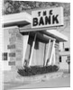 1960s window storefront of bank building by Anonymous