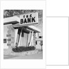 1960s window storefront of bank building by Anonymous