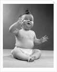 1950s full figure baby sitting gesture hand touching cheek face expression funny by Anonymous