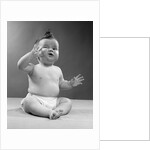 1950s full figure baby sitting gesture hand touching cheek face expression funny by Anonymous