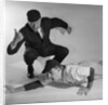 1950s baseball umpire calling sliding player out studio shot by Anonymous
