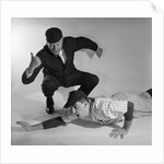 1950s baseball umpire calling sliding player out studio shot by Anonymous