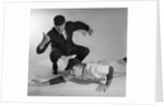 1950s baseball umpire calling sliding player out studio shot by Anonymous
