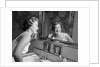 1950s smiling woman looking into bathroom mirror brushing teeth by Anonymous