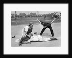 1950s little league umpire calling safe player sliding into home plate by Anonymous