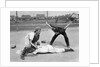 1950s little league umpire calling safe player sliding into home plate by Anonymous