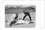 1950s little league umpire calling safe player sliding into home plate by Anonymous